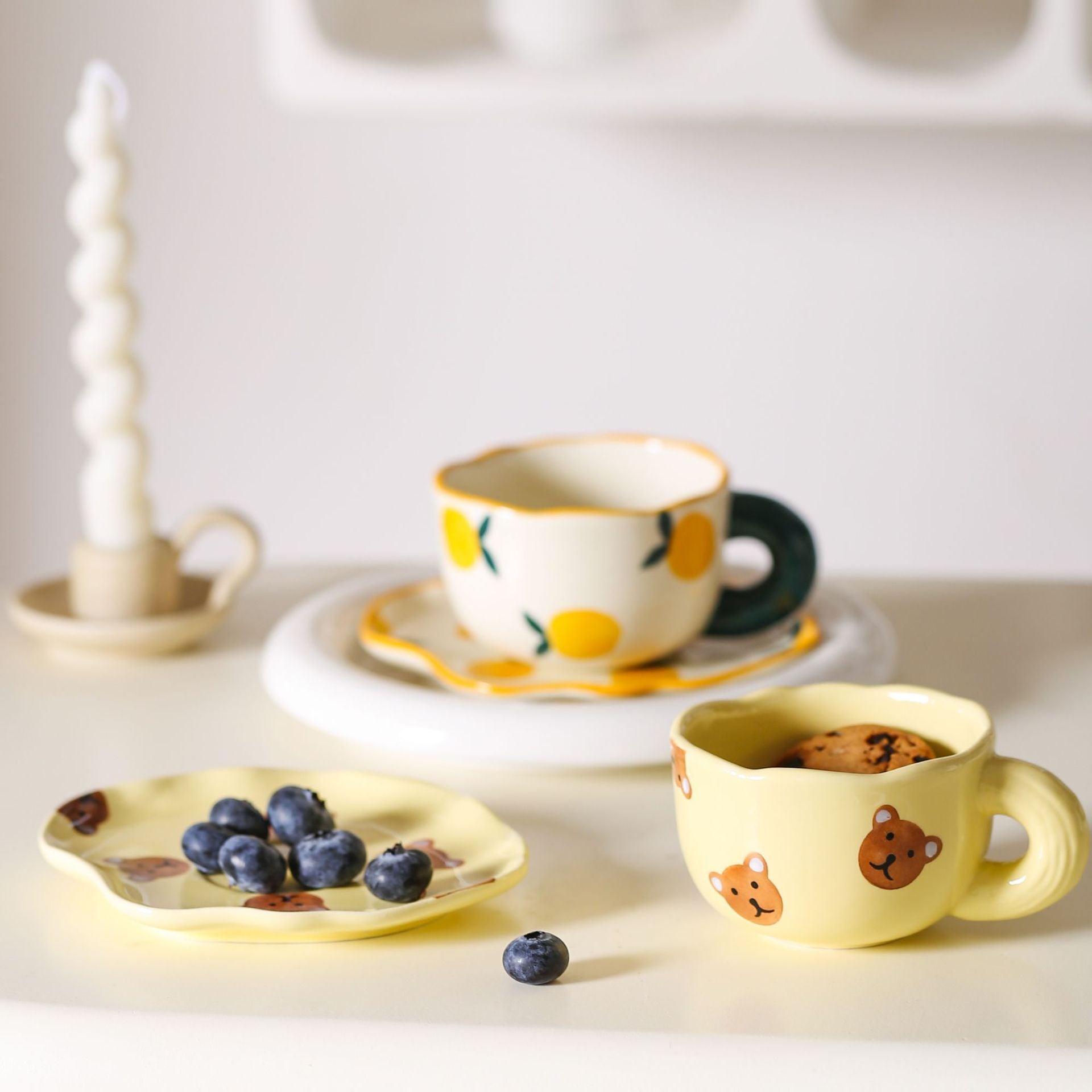 Colorful teatime cup and saucer - yellow bear