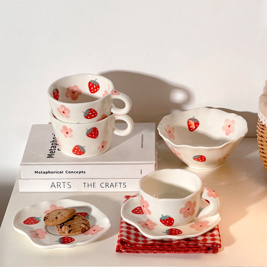 Colorful teatime cup and saucer - straberry