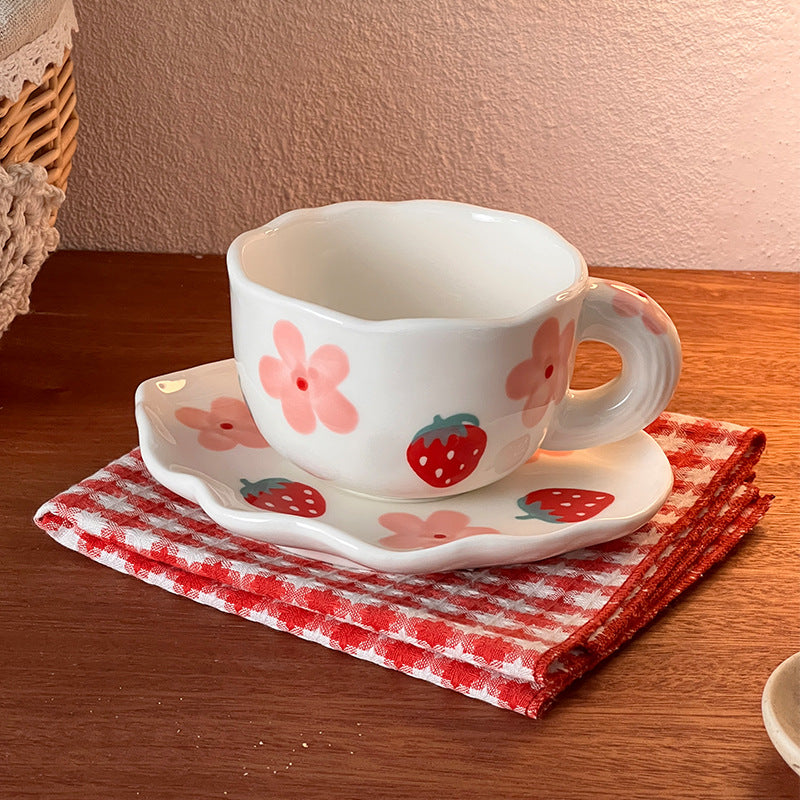 Colorful teatime cup and saucer - flower strawberry