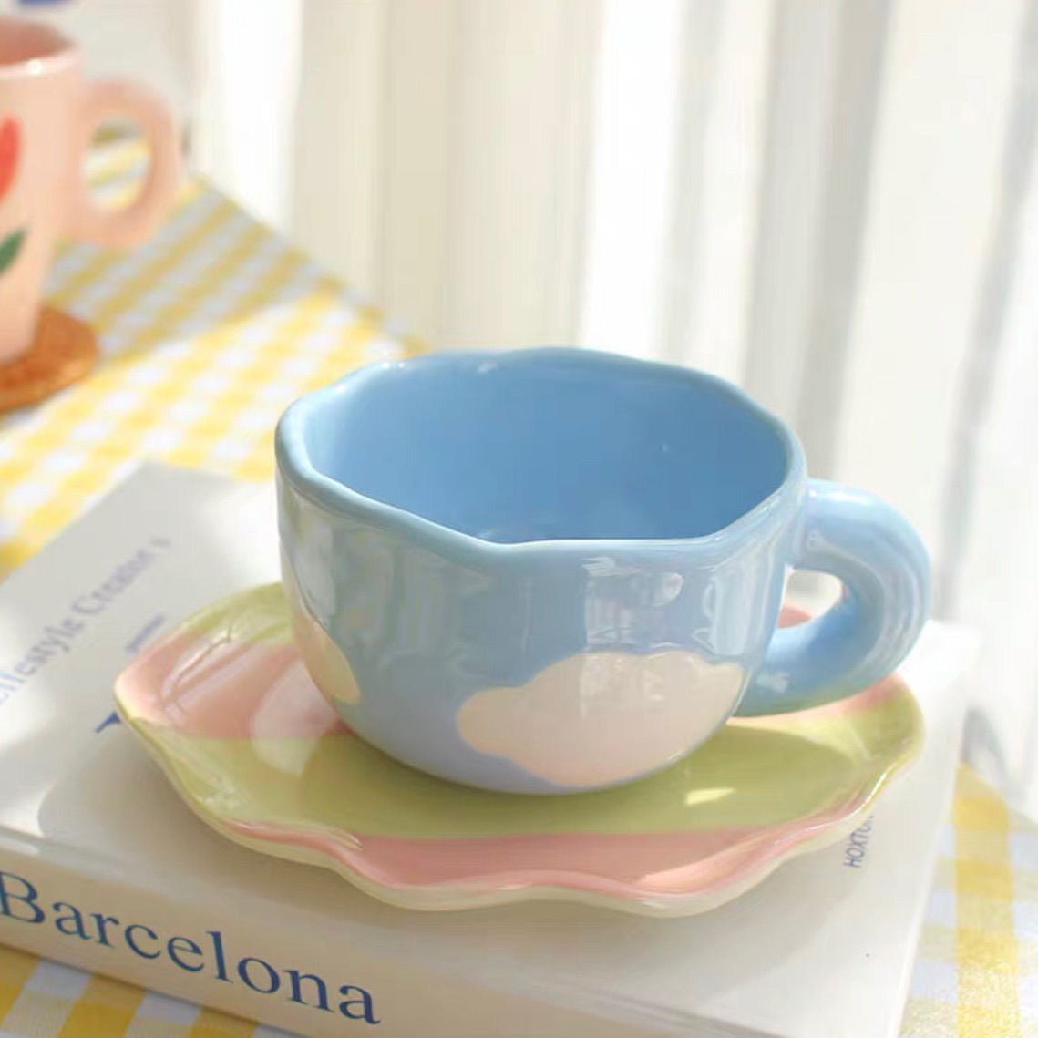 Colorful teatime cup and saucer - blue sky cloud