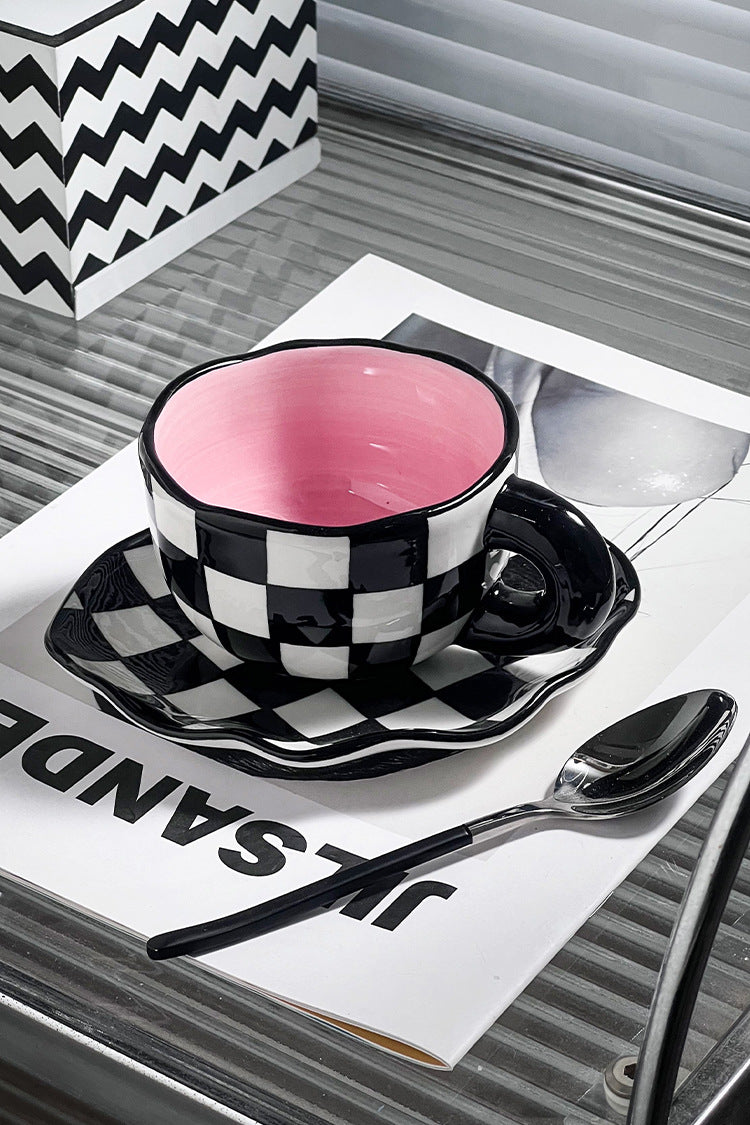 Colorful teatime cup and saucer - black and white plaid