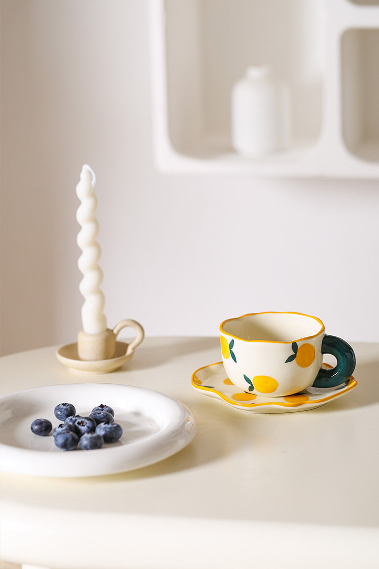 Colorful teatime cup and saucer - white lemon