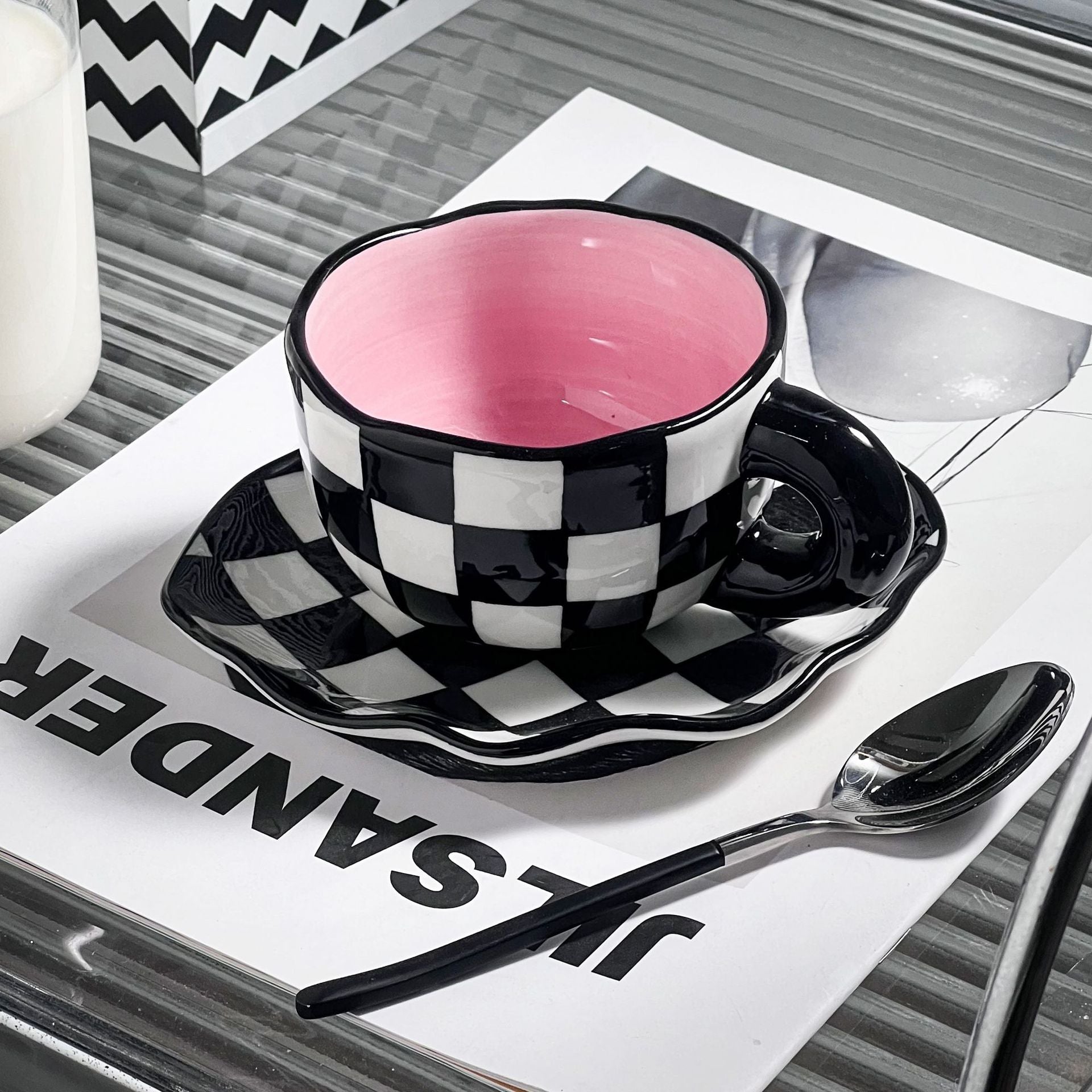 Colorful teatime cup and saucer - black and white plaid